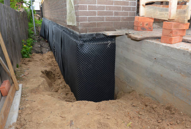 SJ Waterproofing Pros technician performing targeted Waterproofing assessment in Florence, KY